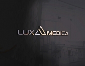 Projekt graficzny, nazwa firmy, tworzenie logo firm Logo przychodni lekarskiej Luxmedica - feim
