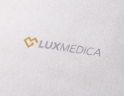 Projekt graficzny, nazwa firmy, tworzenie logo firm Logo przychodni lekarskiej Luxmedica - radofreshdesign