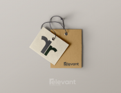 Projekt graficzny, nazwa firmy, tworzenie logo firm Logo dla producenta odzieży RELEVANT - landmark