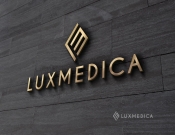 Projekt graficzny, nazwa firmy, tworzenie logo firm Logo przychodni lekarskiej Luxmedica - timur