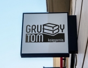 Projekt graficzny, nazwa firmy, tworzenie logo firm Logotyp dla księgarni GrubyTom - Veles3000