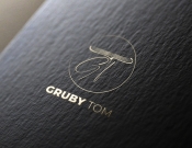 Projekt graficzny, nazwa firmy, tworzenie logo firm Logotyp dla księgarni GrubyTom - Blanker